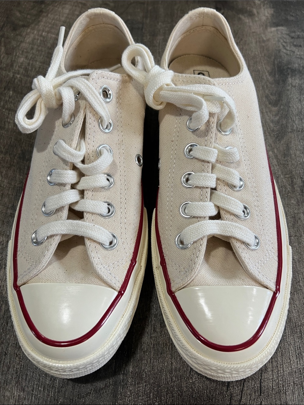 Brand new Converse Low-Top Sneakers with Red trim Size 7 women’s Size 5 mens